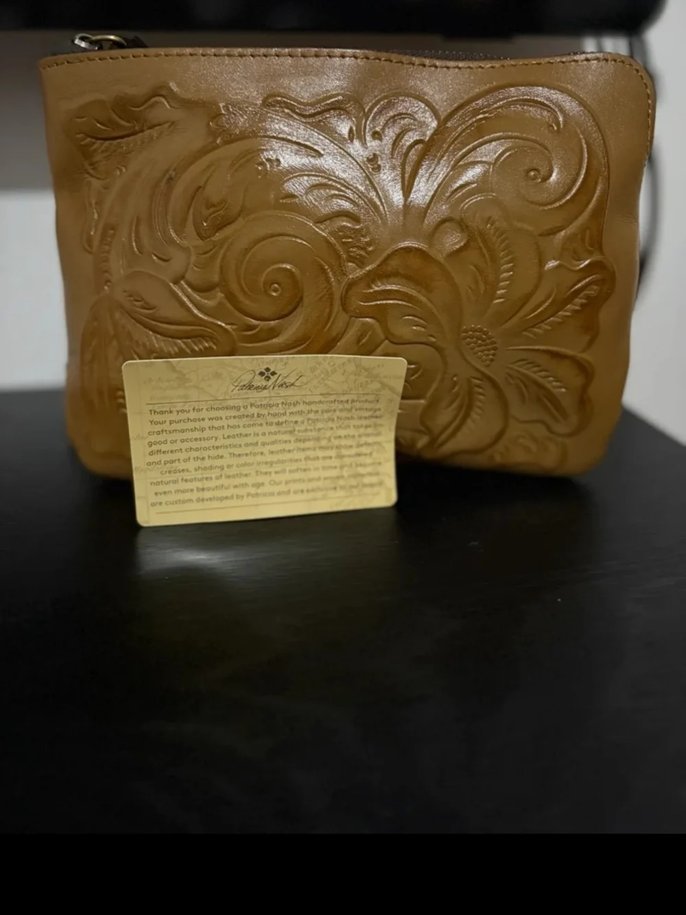 Authentic brand new Patricia Nash clutch in the color biscuit- never used-perect